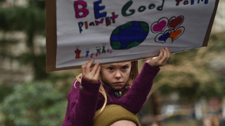 More than a thousand children from city schools gathered in City Hall Park to protest climate change and against the Williams Gas Pipeline plan.