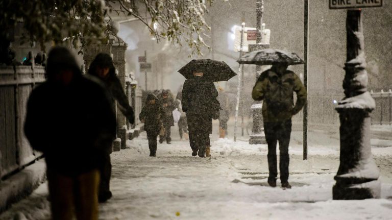 NYC weather: 1st snow of the season hits the 5 boroughs 2 The scene on Park Row near City Hall in Manhattan on Thursday.