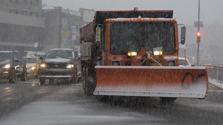 A snowplow on Queens Boulevard in Kew Gardens, Queens, on Nov. 15, 2018.