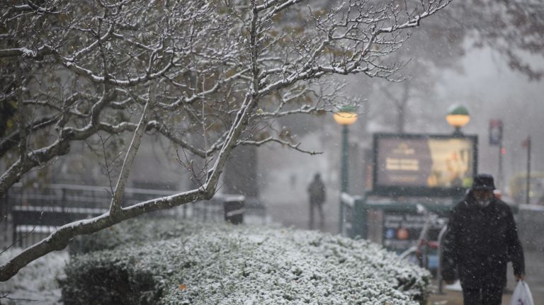 A snowy subway entrance in Kew Gardens, Queens, on Nov. 15, 2018.