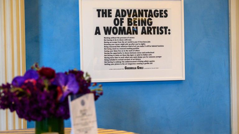 "The Advantages of Being a Woman Artist" by Guerrilla Girls is displayed at Gracie Mansion at the opening of its biggest art exhibit yet that features the work of 44 female artists.&nbsp;