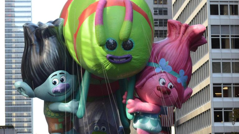 Trolls float down Sixth Avenue during the Macy's Thanksgiving Parade on Thursday.