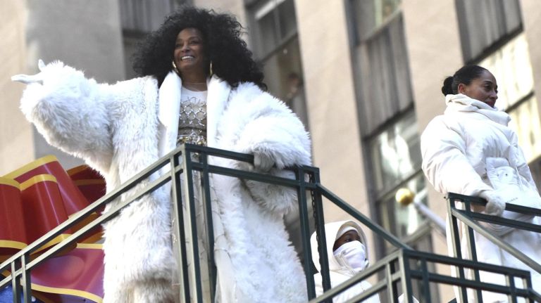 Diana Ross and her daughter Tracee&nbsp;Ellis Ross, right, wave to the crowds from their float&nbsp;during the Macy's Thanksgiving Parade on Thursday.