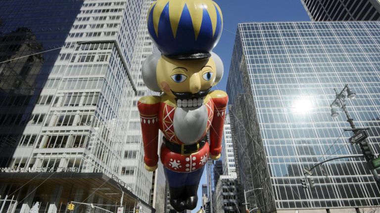 The Nutcracker floats above Sixth Avenue at 42nd Street during the 92nd Macy's Thanksgiving Day Parade in Manhattan.