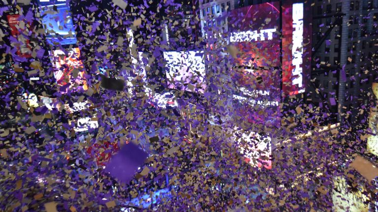 Confetti rains down on New Year's Eve revelers from the New York Marriott Marquis Hotel in Times Square on Sunday, Dec. 31, 2017.