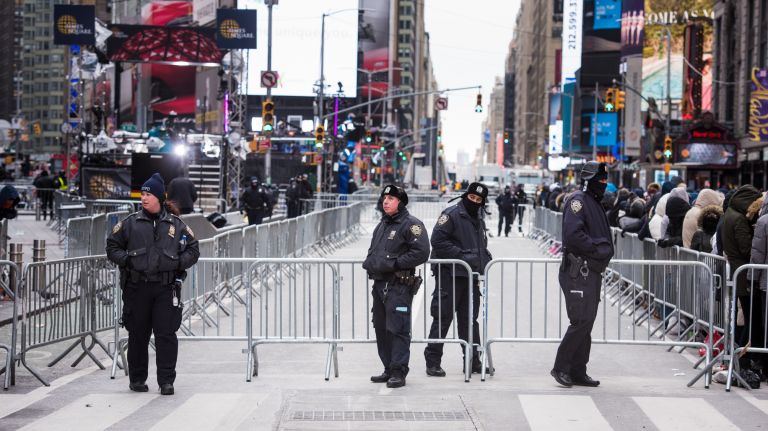 Police in Times Square before the New Year's Eve celebration in Manhattan on Sunday, Dec. 31, 2017.