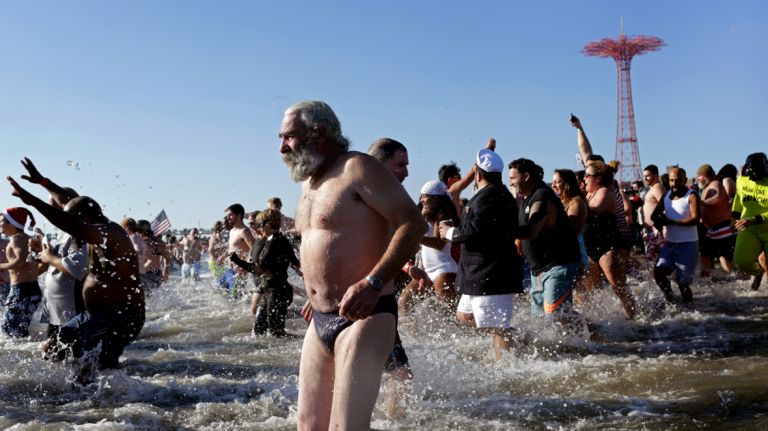 The Coney Island Polar Bear Club finds thousands plunging into the icy Atlantic on New Year's Day.