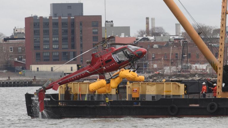 Best of 2018: Top New York City photos of the year 29 A U.S. Army Corp of Engineer salvage team hoist the wreckage of a Liberty Helicopters tour craft out of the East River, Manhattan, Monday, March 12, 2018. Five passengers in a helicopter chartered for a photo shoot died after the aircraft crashed into the East River on Sunday evening.