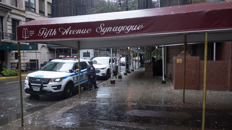 Anti-Semitic hate crimes won't 'ever be tolerated' in NYC, police say 1 A police officer stands watch outside Manhattan's Fifth Avenue Synagogue on Oct. 27, after the fatal Pittsburgh synagogue shooting that day.