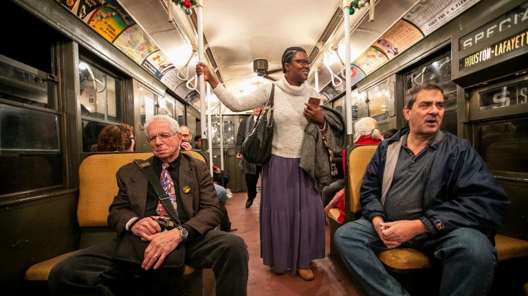 Inside the MTA nostalgia train 13 Maury Englander of Manhattan, Shannon Harris of Manhattan and Howard Fein of Queens on the holiday vintage 1930s R1-9 train car. Englander, of Manhattan, said he is pretty sure he used to ride this train with his girlfriend when he was 19.