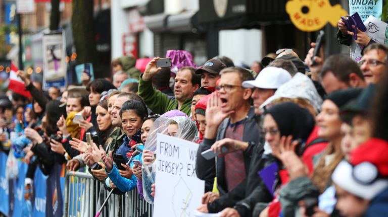 People cheer for runners during the New York City Marathon on Nov 5, 2017 in Manhattan.