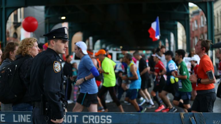 A police officer looks on during the New York City Marathon in Long Island City on Nov. 5, 2017.
