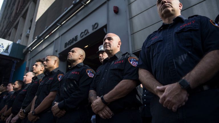 Members of Engine Co. 10 and Ladder 10 gathered outside their firehouse to pause for a moment of silence Monday morning to commemorate the 16th anniversary of 9/11 attack at the World Trade Center site in lower Manhattan.
