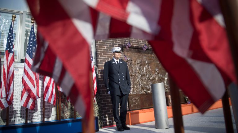 Members of Engine Co. 10 and Ladder 10 gathered outside their firehouse to pause for a moment of silence Monday morning to commemorate the 16th anniversary of 9/11 attack at the World Trade Center site in lower Manhattan.