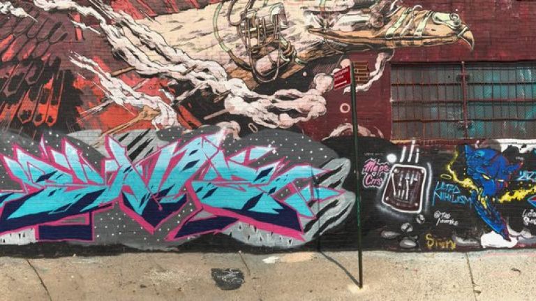 A continuous mural on Vandervoort Place in East Williamsburg stretches almost the entire block between Thames Street and Flushing Avenue.