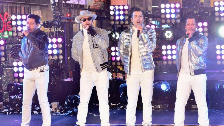NEW YORK, NY - DECEMBER 31: Jonathan Knight, Donnie Wahlberg, Jordan Knight and Danny Wood of New Kids on the Block perform on stage during Dick Clark's New Year's Rockin' Eve With Ryan Seacrest 2019 on December 31, 2018 in New York City. (Photo by Eugene Gologursky/Getty Images for Dick Clark's New Year's Rockin' Eve)