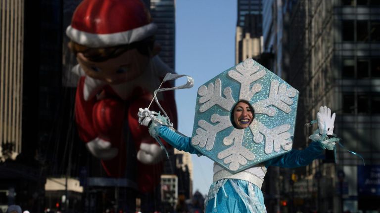 The 92nd Macy's Thanksgiving Day Parade makes its way down Sixth Avenue in Manhattan.