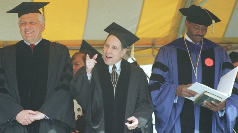 A former Queens College graduate, Paul Simon returns to receive an honorary degree in 1997.