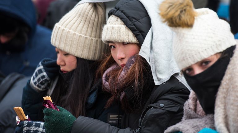 Revelers in Times Square before the New Year's Eve celebration on Sunday, Dec. 31, 2017.