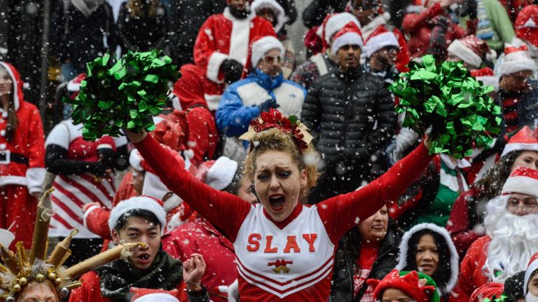 Santa has a cheerleader.