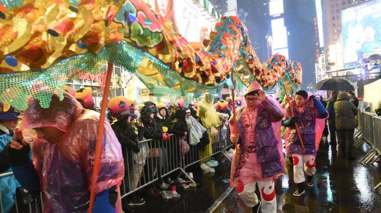 Scores of&nbsp;people attended the Times Square New Year's Eve ball drop in Times Square, with many getting there early in the morning.