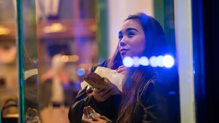 Rockefeller Center Christmas tree lighting: See photos 28 A woman looks at preparations for the Rockefeller Center Christmas Tree Lighting from the window of Kate Spade in NYC on Nov. 28, 2018.