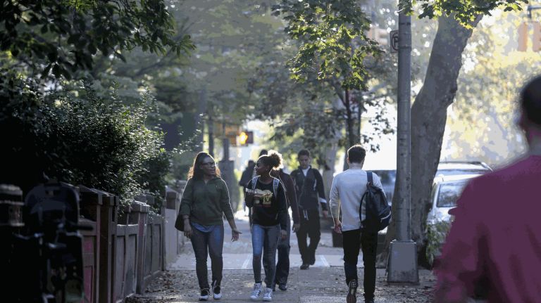 What to do and where to eat in Carroll Gardens, Brooklyn's peaceful neighborhood 4 People walking on 2nd Place between Clinton and Henry streets in Carroll Gardens.
