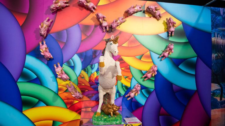 Candytopia: Wonka-esque sweets pop-up is extended through the holiday season 27 When you push through a strange room made of inflatable walls, you'll find yourself in this colorful utopia featuring Trolli gummies, this candy unicorn, flying pigs that shoot confetti out of their butts (that's right) and a spinning floor to give you the dizziness that comes with a sugar high.