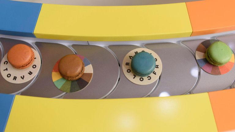 Let's cut to the chase. There's a conveyor belt of macarons at the 