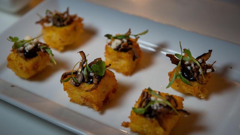 Grits with pickled shiitakes,&nbsp;one of the hors d'oeuvres served at the party.