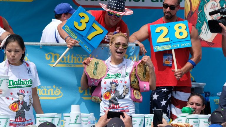 Miki Sudo wins the 2018 women's contest after downing 37 hot dogs in 10 minutes.