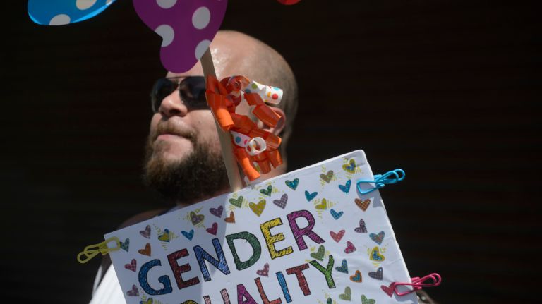 1 Bronx Pride March: Advocates parade through the streets 15 Manhattan resident Gustavo Morales, who grew up in the Bronx, joins members of the LGBTQ community during the Bronx Pride March.