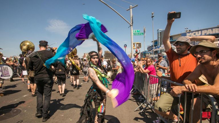 A participant dances at the Mermaid Parade in Coney Island.