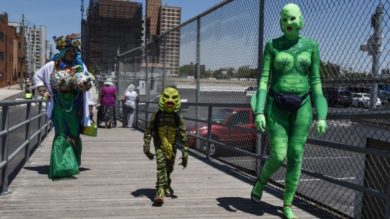 People participate in the annual Mermaid Parade in Coney Island.