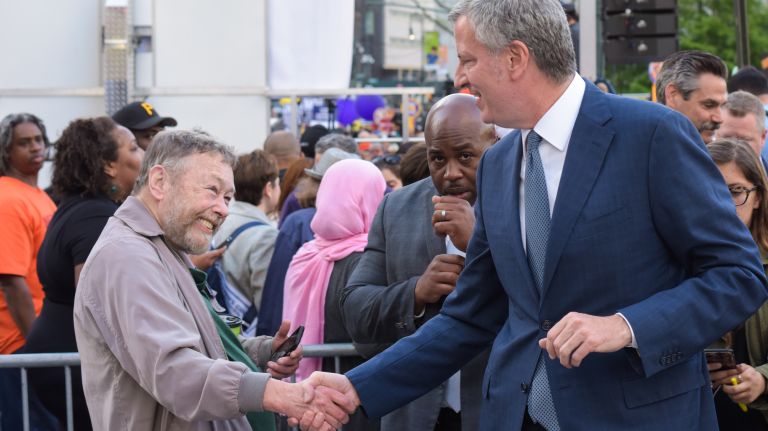 May Day protests: Photos of the 2017 NYC demonstrations 21 Mayor Bill de Blasio with a man at the May Day rally in Foley Square in Manhattan on Monday, May 1, 2017.