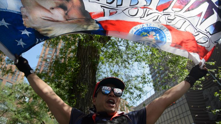 May Day protests: Photos of the 2017 NYC demonstrations 35 A supporter of President Donald Trump joins a May Day rally in Union Square Park on May 1, 2017.