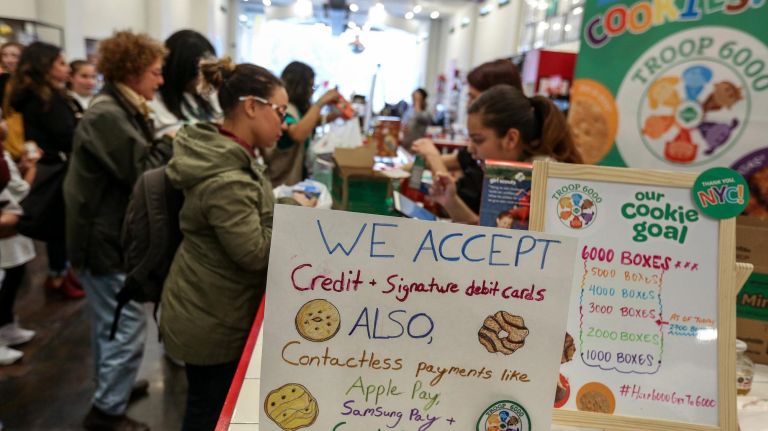 Homeless Girl Scouts extend cookie sale in Union Square 13 Customers line up at the Kellogg's NYC Cafe to buy Girl Scout cookies from Troop 6000, based in Long Island City.