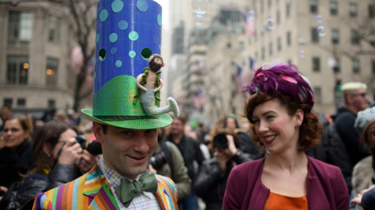 Bubbles float out of a hat during the Easter parade and bonnet festival.