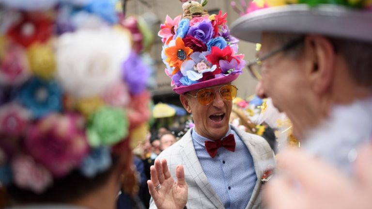 People show off their Easter bonnets on Fifth Avenue.