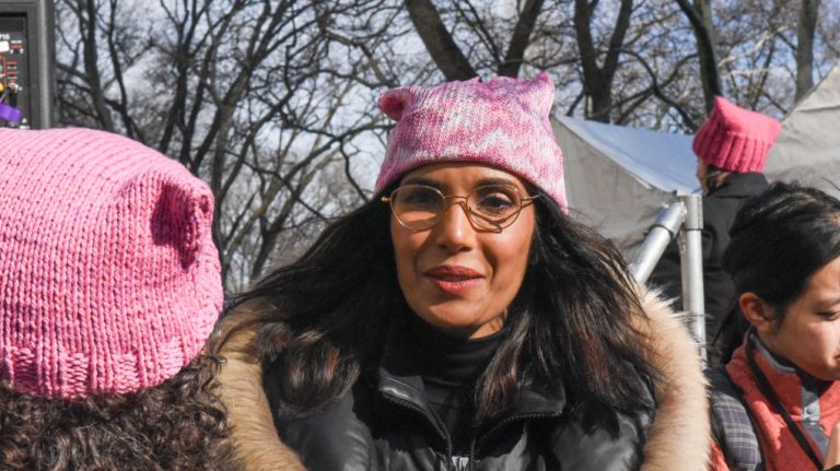Padma Lakshmi -- wearing a pussyhat -- makes her way through the crowd before the Women's March on Jan. 20, 2018, in Manhattan. 