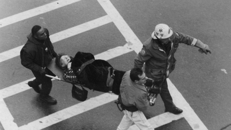 An injured woman is carried away from the World Trade Center after the explosion in the north tower on Feb. 26, 1993.