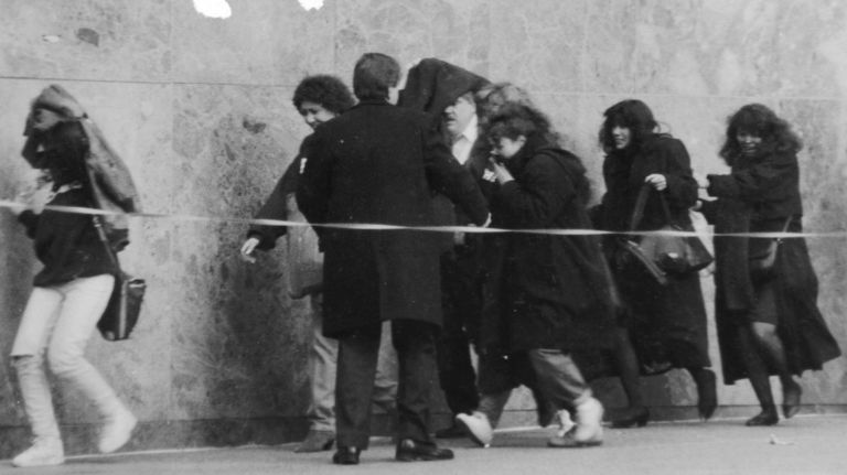 Office workers run from the World Trade Center after the explosion rocked the north tower on Feb. 26, 1993.