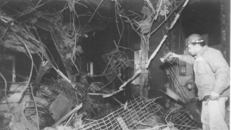 A workman checks the damage inside a room on the ground floor of the Vista Hotel, located just above the World Trade Center parking garage, on Feb. 26, 1993. 