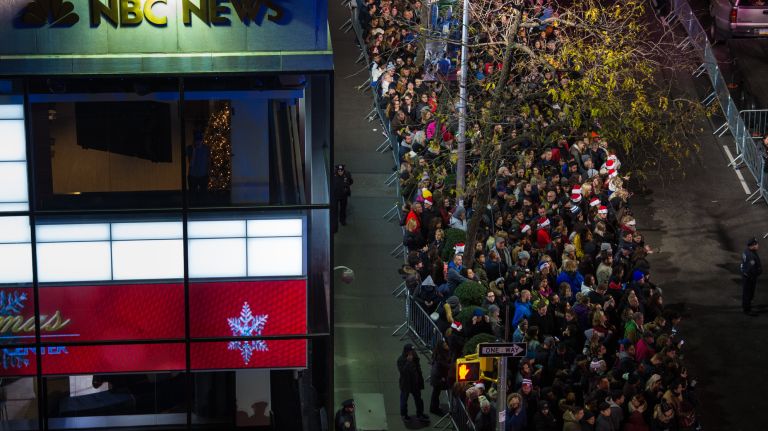 People wait to see the tree lighting on Wednesday, Nov. 29, 2017. 