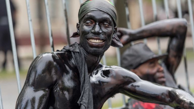 Costumed dancers march at the West Indian Day Parade along Eastern Parkway in Brooklyn on Monday, Sept. 5, 2016.