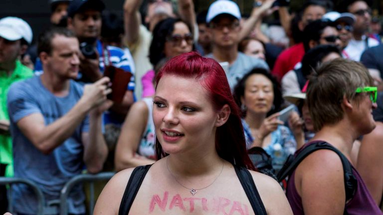 Misty Cartner of Syracuse before the GoTopless Pride Parade on Sunday, Aug. 28, 2016, in Manhattan.