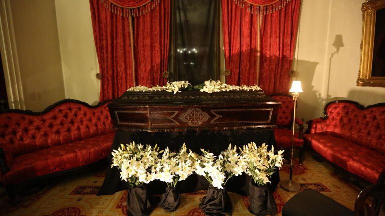 The front parlor is set up for a funeral at the Merchant's House Museum.