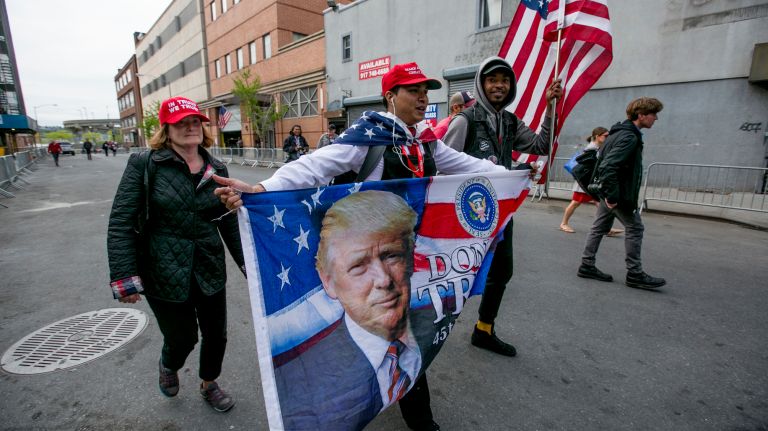 Pro-Trump demostrators walk around Manhattan before the president's visit to the Intrepid Air and Space Museum, on May 4, 2017.