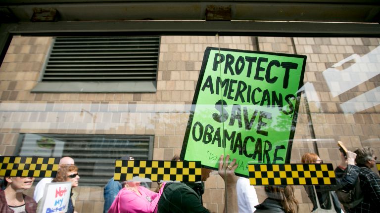 Anti-Trump demonstrators march down the West Side Highway in Manhattan before President Donald Trump's arrival at the Intrepid Sea, Air & Space Museum on Thursday, May 4, 2017.