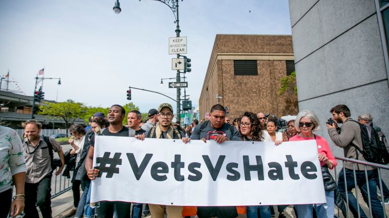 Demonstrators march down the West Side Highway in Manhattan before President Donald Trump's arrival at the Intrepid Sea, Air & Space Museum on Thursday, May 4, 2017. 